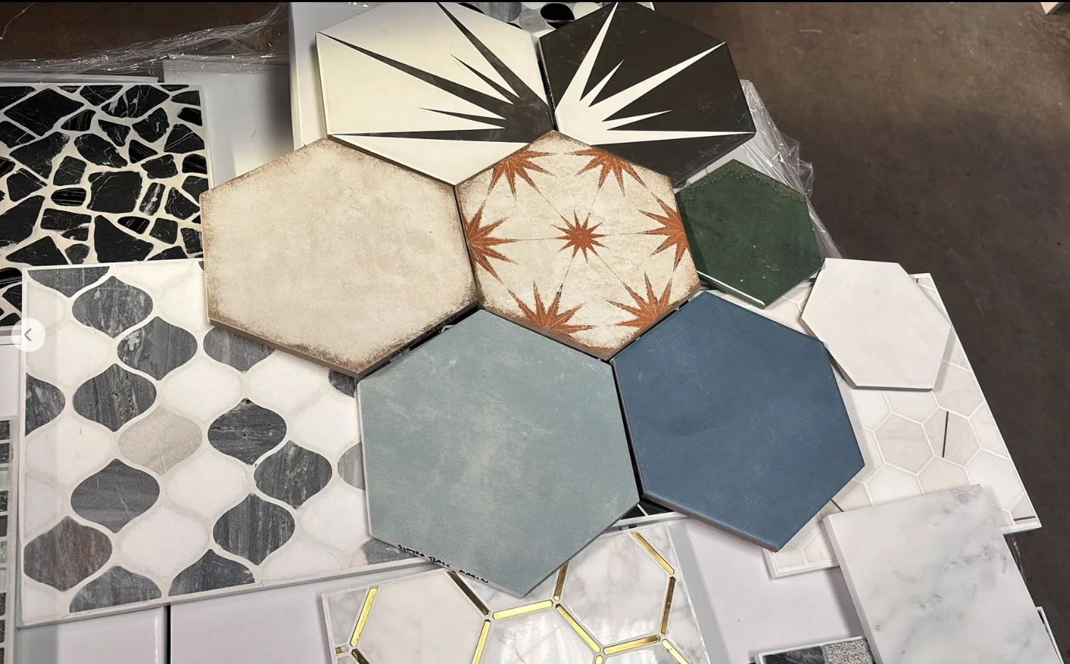 Mixed color hexagon tile samples with blue green and neutral tones