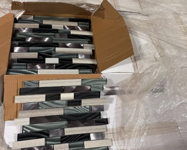Box of linear mosaic tile pieces