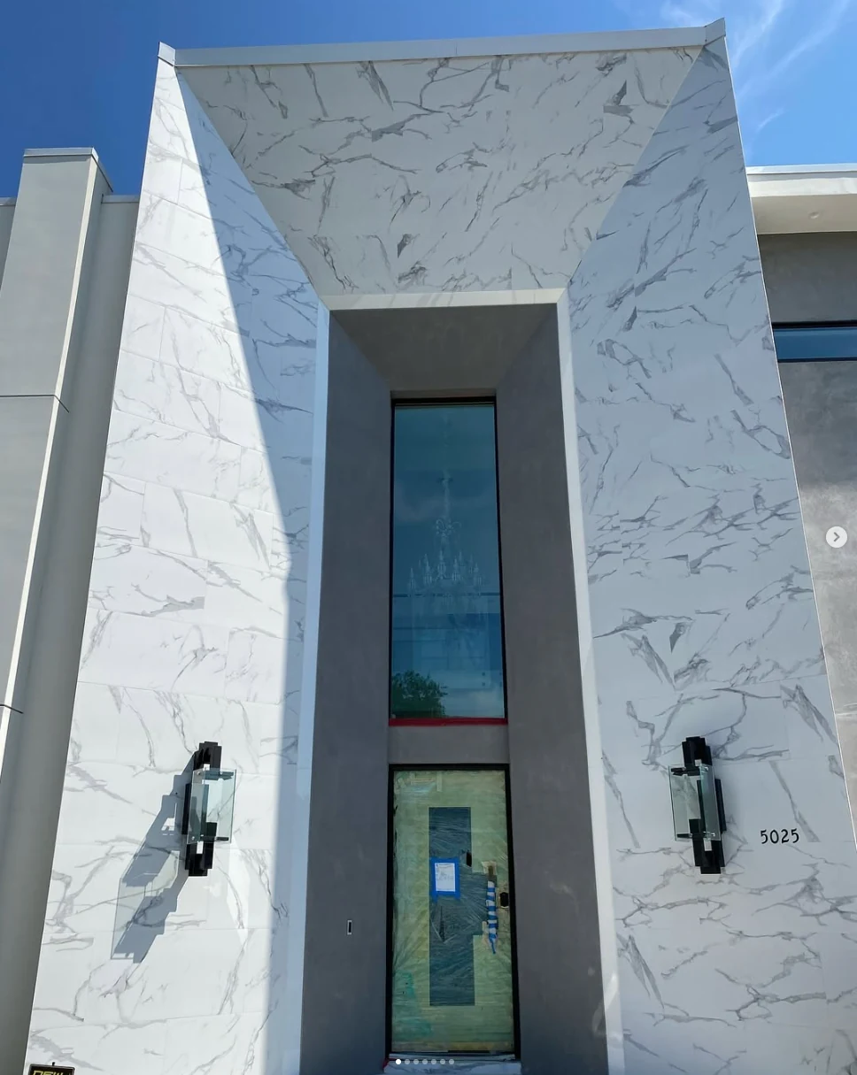 Luxury exterior marble facade with large-format stone panels